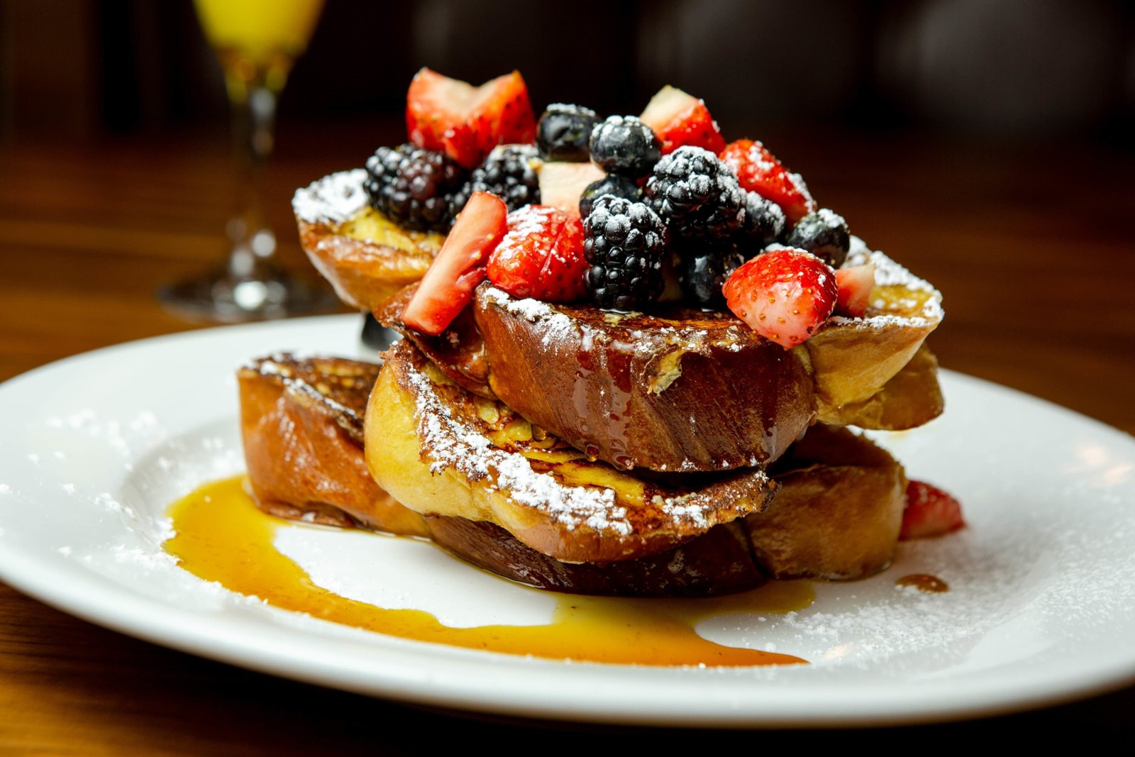 French toast topped with fresh berries at Bella’s Cafe