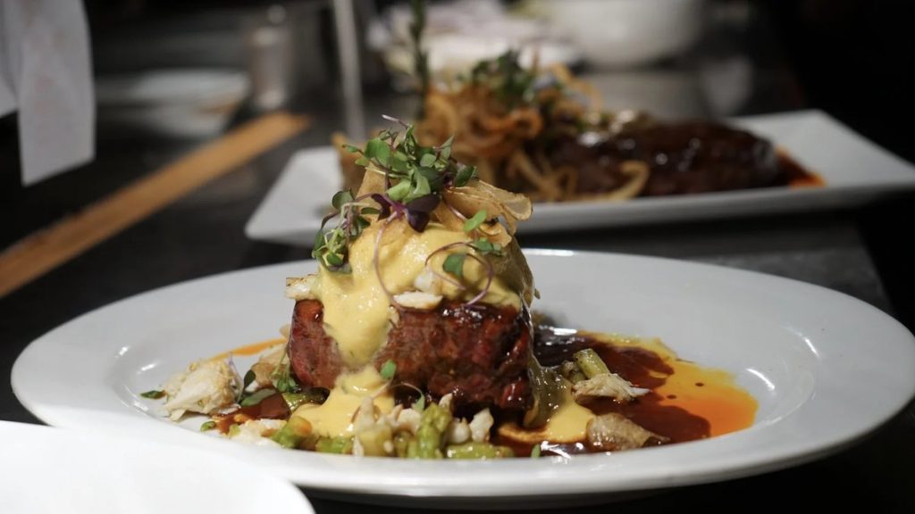 The Chef’s Filet Mignon plated with sauce at Shell & Bones