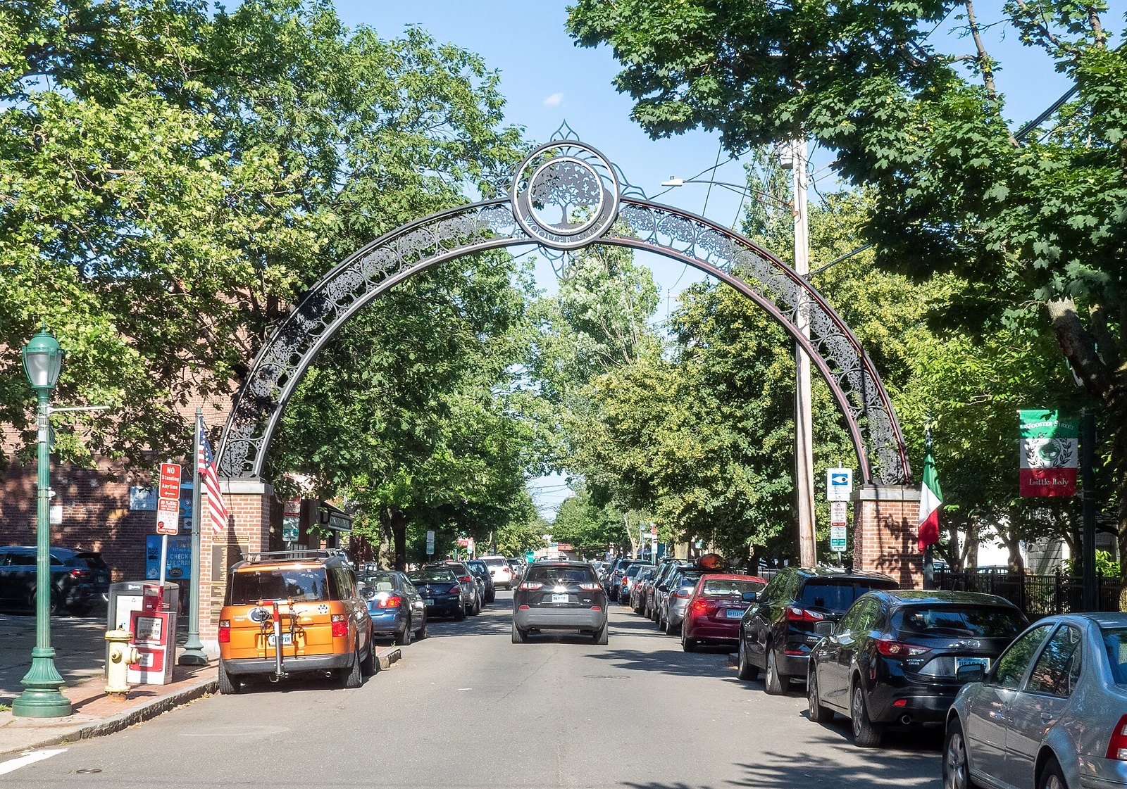 Brick row buildings and storefronts along Wooster Street in New Haven