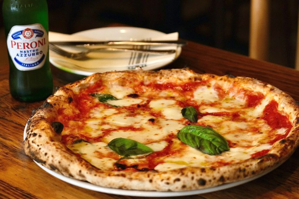A Zeneli Margherita with San Marzano tomatoes, fresh mozzarella and basil