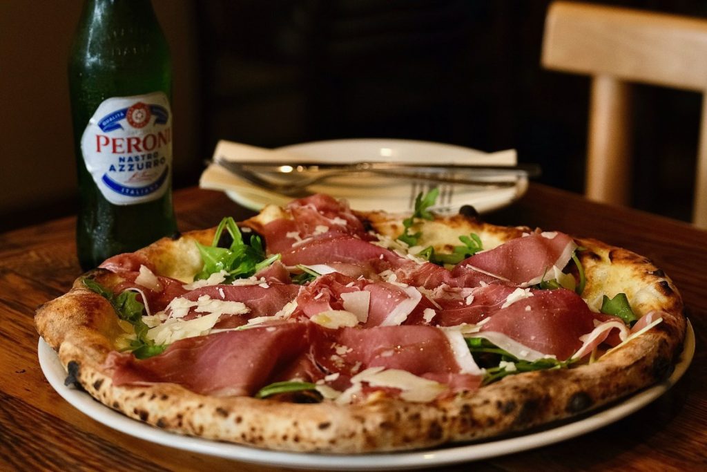 The Ventura white pizza with arugula and Prosciutto di Parma